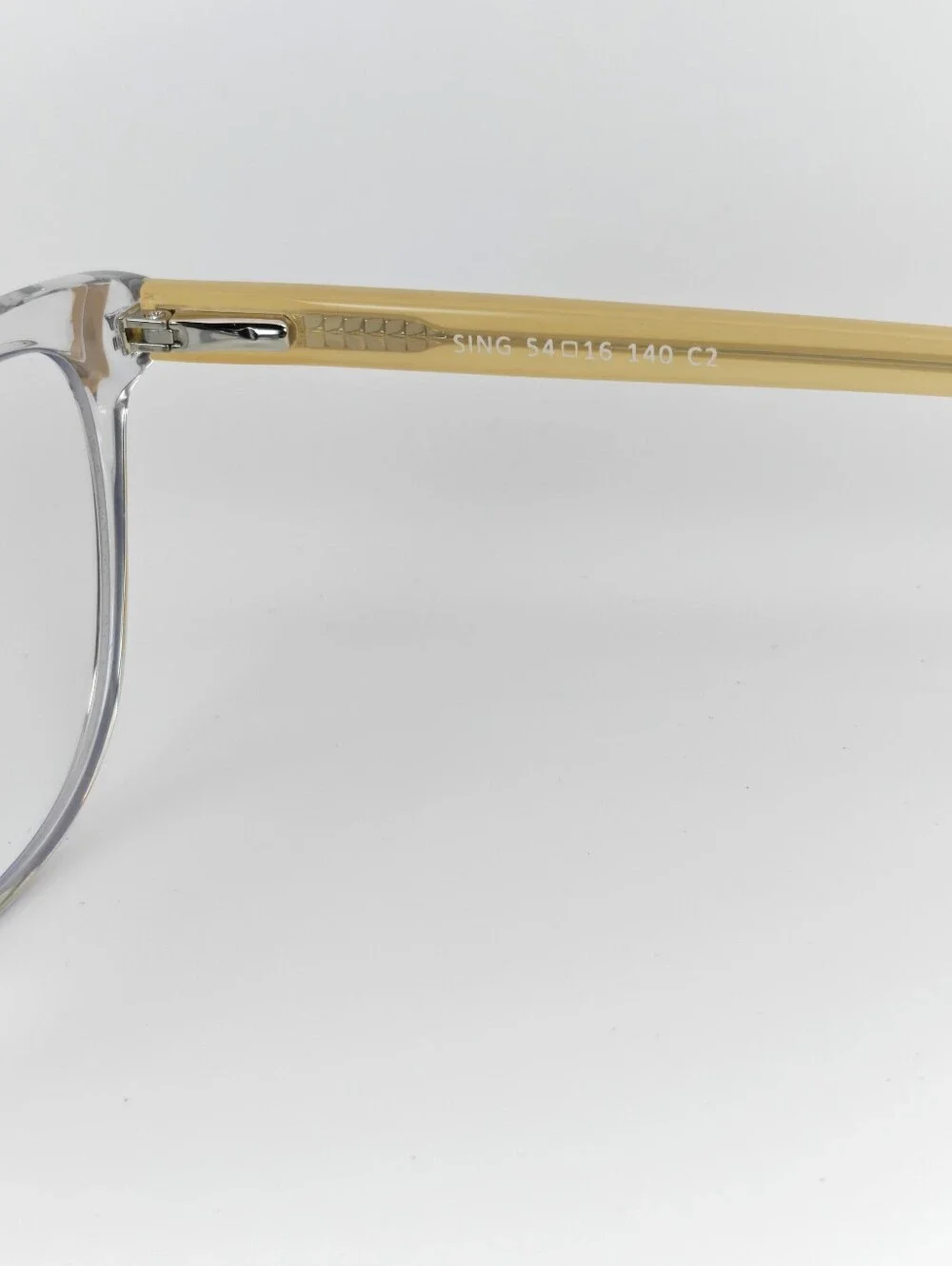 Sing. Clear Cat-Eye Reading Glasses with Vanilla Temples. Minimalist.